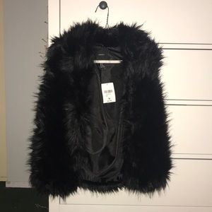Black faux fur vest